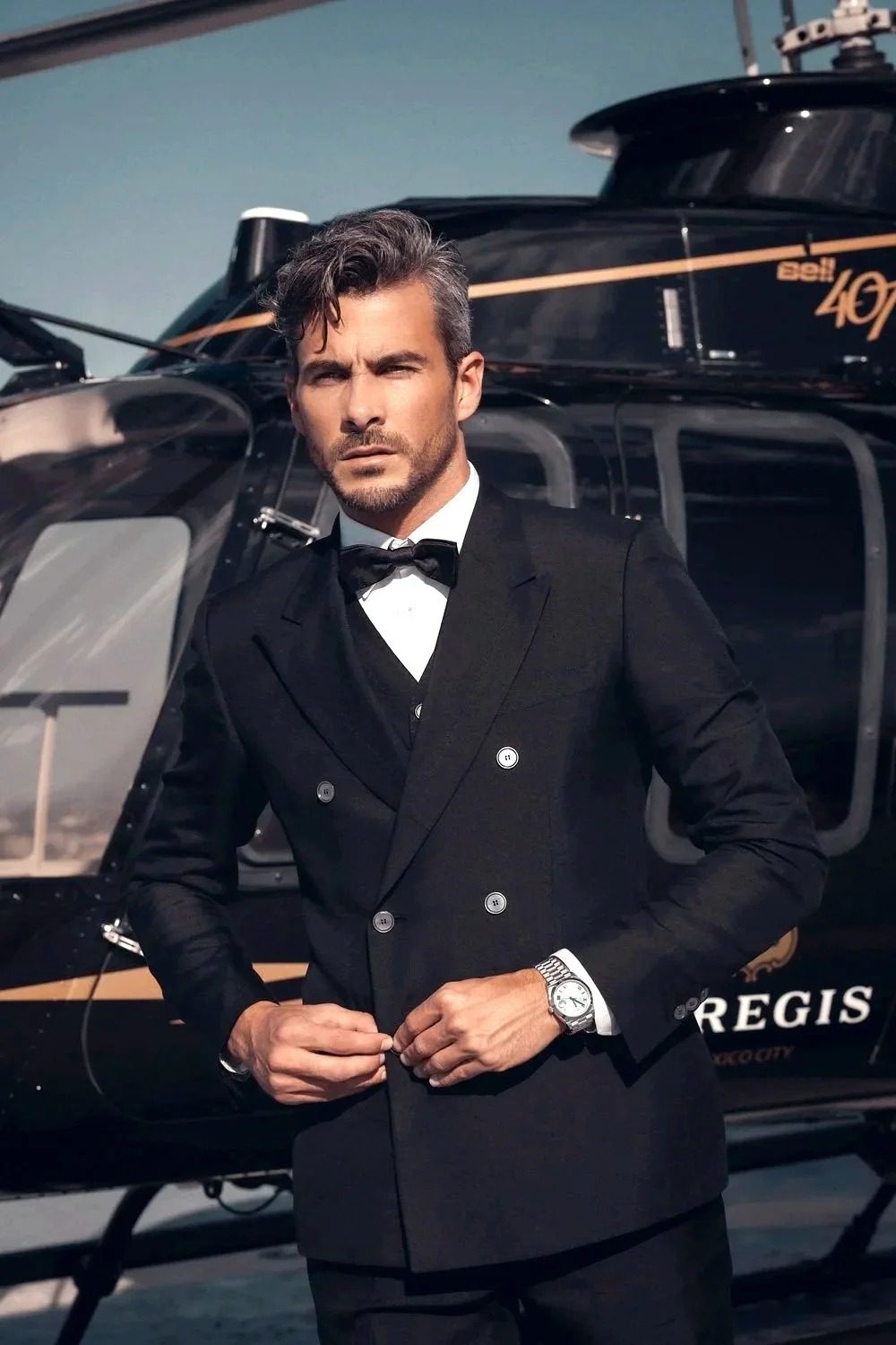 Man in black tie in front of a helicopter, Dolce & Gabbana, St. Regis Mexico City